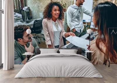 Young business people in office Wall mural