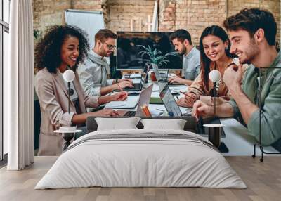 Young business people in office Wall mural