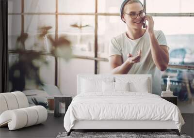 Young man in modern office Wall mural