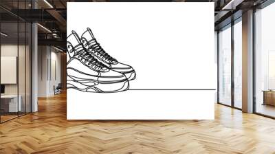 Vector illustration of sneakers sports shoes in a continuous one line isolated white background Wall mural