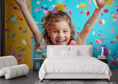 Exuberant young child throwing confetti in the air, surrounded by balloons, expressing the unadulterated happiness of a party. Wall mural