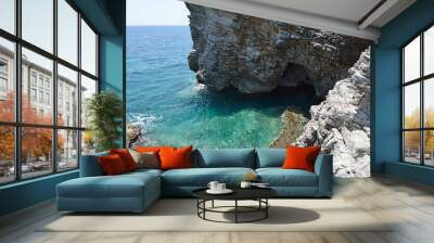 Panoramic view of the small cove and grotto in rocks. Wall mural