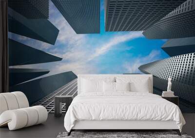 Skyscrapers on blue sky. Camera looking up. 3D rendered illustration. Wall mural