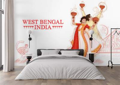 couple performing Dhunuchi dance traditional folk dance of West Bengal, India Wall mural