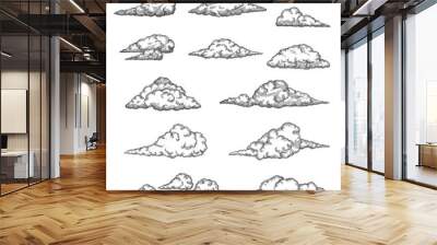 Cloud and cloudiness vintage sketches. Vector hand drawn sky of ancient engraved fluffy clouds, antique map elements. Cloudscape with etching texture of curved air streams, cloudy heaven Wall mural