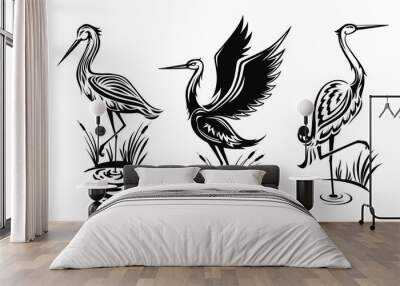 Heron or wader birds vector icons, black hern silhouettes stand in swamp water with reeds. Egrets with ornate body wading in marsh side view, tattoo design emblems isolated on white background set Wall mural