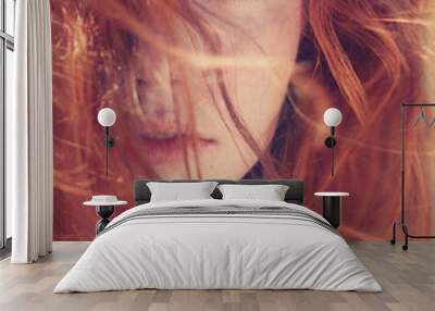 Portrait of red-haired girl close-up Wall mural