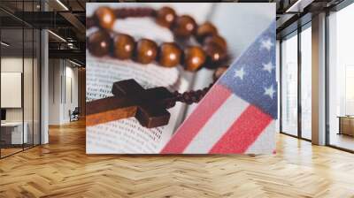 American flag against cross rosary over bible Wall mural