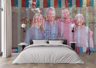 American flag design overlay against portrait of caucasian family smiling standing in the garden Wall mural