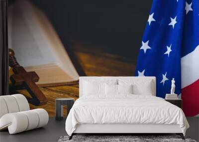 American flag over cross rosary over bible against wooden background Wall mural