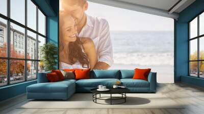 Attractive couple cuddling Wall mural