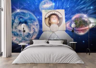 Composite image of boy pretending to be an astronaut Wall mural