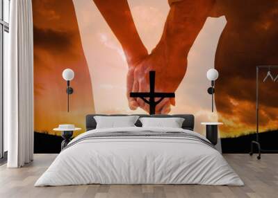 Composite image of bride and groom holding hands close up Wall mural