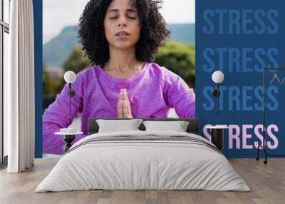 Composition of stress awareness month text over african american woman doing yoga Wall mural