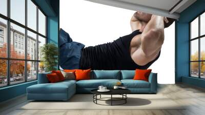 Confident athlete doing crunches Wall mural