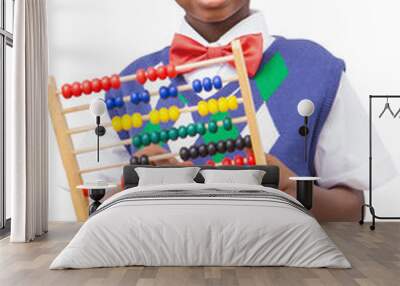 Digital png photo of happy african american boy holding abacus on transparent background Wall mural