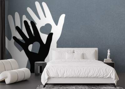 Illustration of black and white hands with heart shapes Wall mural