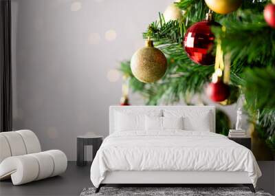 Image of christmas tree with baubles decoration and copy space on grey background Wall mural