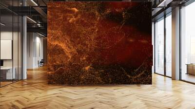 Image of orange particle cloud moving over black background Wall mural