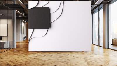 Square of black paper with copy space on white waves of paper on white background Wall mural