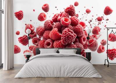 Explosion of raspberries on transparent background Wall mural