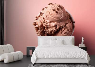 A chocolate ice cream with a scoop with creamy texture on pastel background, Overhead shot, created with Generative AI Wall mural