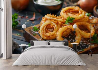 Tempting classic onion rings with crispy batter, garlic aioli, and fresh parsley garnish Wall mural