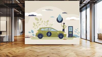 Green electric car with sustainable power consumption tiny person concept. Alternative energy for automobile charging as environmental friendly solution vector illustration. Hybrid vehicle battery. Wall mural