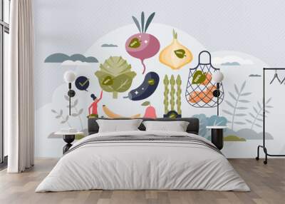 Organic food eating and ecological groceries shopping tiny person concept. Natural bio vegetables and fruits consumption for healthy meals vector illustration. Seasonal biological nutrition diet. Wall mural