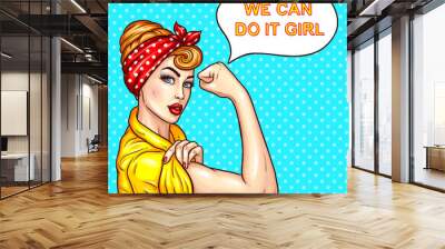 Vector pop art illustration of an attractive confident woman housewife demonstrating her strength by roll up her sleeve. Motivating poster with a housewife talking We can do it, girl Wall mural