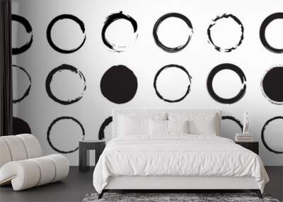 Grunge circle brush icon. Set different circle brush strokes. Set of black grunge circles shapes on a white background. Paint brush stamp collection. Hand drawn paint brush circle logo frame Wall mural