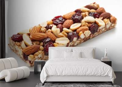 A bar of food with nuts and raisins. It looks like a snack bar. The nuts are scattered all over the bar Wall mural