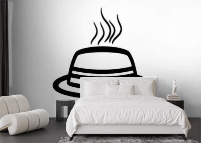 A delicious looking fried egg with toast and pancake on a hot plate, served in front of a coffee mug. Wall mural