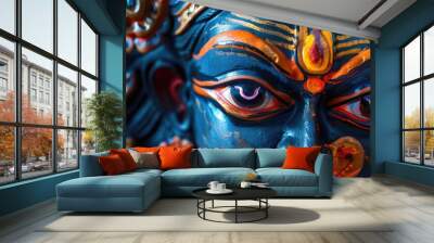 A woman's face with a blue and gold face mask Wall mural