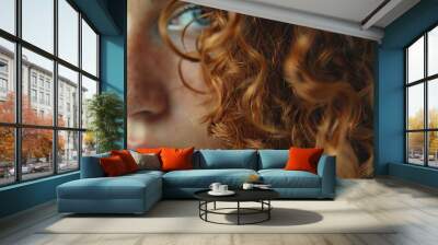 A woman with red hair and blue eyes. The hair is curly and the woman has a nose Wall mural