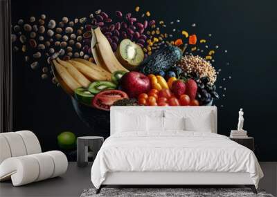 Bright colorful bowl of fresh fruit and nuts on dark background. Healthy food concept. Wall mural