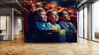 Group of children sitting in movie theater. Perfect for illustrating joy of watching movies with friends. Wall mural