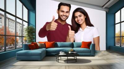 Picture of man and woman showing thumbs up sign. Approval, success, positivity, teamwork, or agreement. It can be utilized in business presentations, marketing materials, social media posts, and more. Wall mural