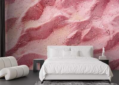 The image shows a close-up view of a pink sand dune in a desert landscape, emphasizing its textured surface and geological features. Wall mural