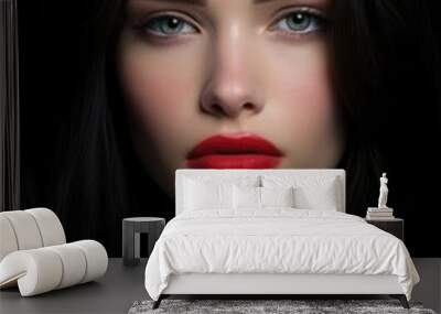 Woman with striking red lipstick and confident expression, perfect for fashion or beauty themes. Wall mural