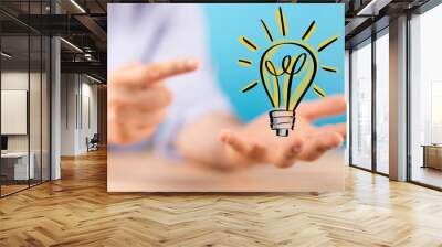 Bright idea in hand concept design art. Wall mural