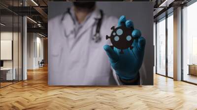 concept doctor with virus in the hand Wall mural