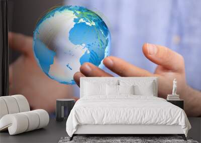 Human Hand Holding The World In Hands. Wall mural