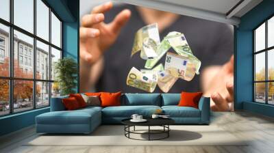 money euro banknote in hand rain Wall mural