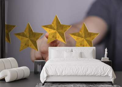 pointing five star symbol to increase rating of company Wall mural