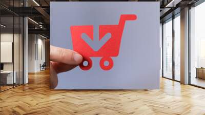 Shopping cart on digital background buying. Wall mural