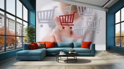 shoppingcart in hand Wall mural