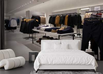 Modern fashionable brand interior of clothing store inside shopping center Wall mural