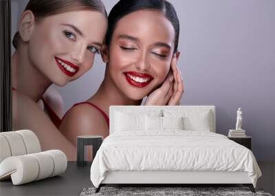 two girls with perfect smile and red lipstick Wall mural