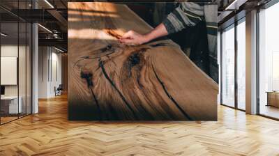 wooden table in solid oak with epoxy resin. Wall mural